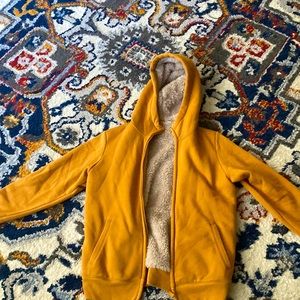 This is a warm sweater, used, in good condition not staines or rips